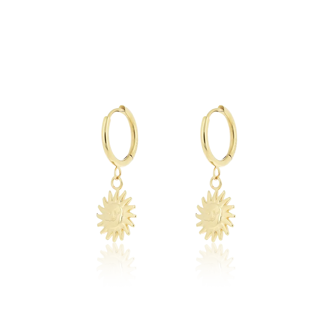 Gold coloured hoop earrings with a sun charm